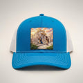 Compared trucker hat in blue and white, front view, patch of two men praying on the temple steps