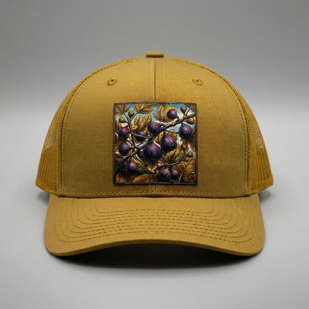 Figs trucker hat in biscuit gold, front view, patch of ripe purple figs on the branch