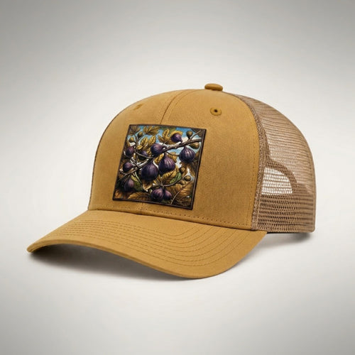 Figs trucker hat in biscuit gold, side view showing the tan mesh back and gold pre-curved bill