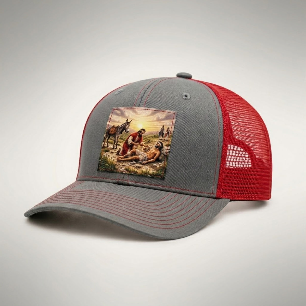 Good Samaritan trucker hat in grey and red, side view showing the red mesh back and grey pre-curved bill
